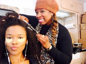 Serayah on set getting styled